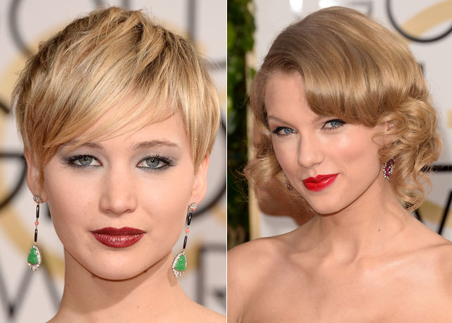 O bordô de Jennifer Lawrence e o vermelho aberto já característico de Taylor Swift no red carpet do Golden Globes 2014 - Fotos: Getty Images
