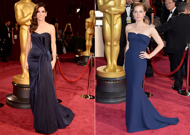 A esquerda Sandra Bullock de Alexander McQueen e a direita Am Adam de Gucci - Fotos: Getty Images