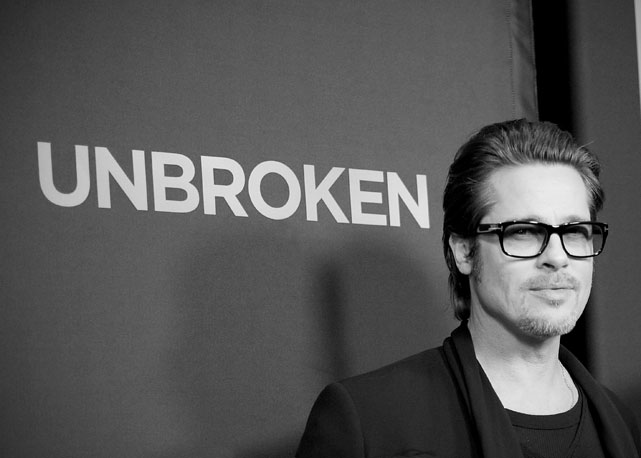 Brad Pitt em 2014, na pré-estreia do filme "Unbroken"^: cabelo cuidadosamente penteado com gel - Foto: Getty Images